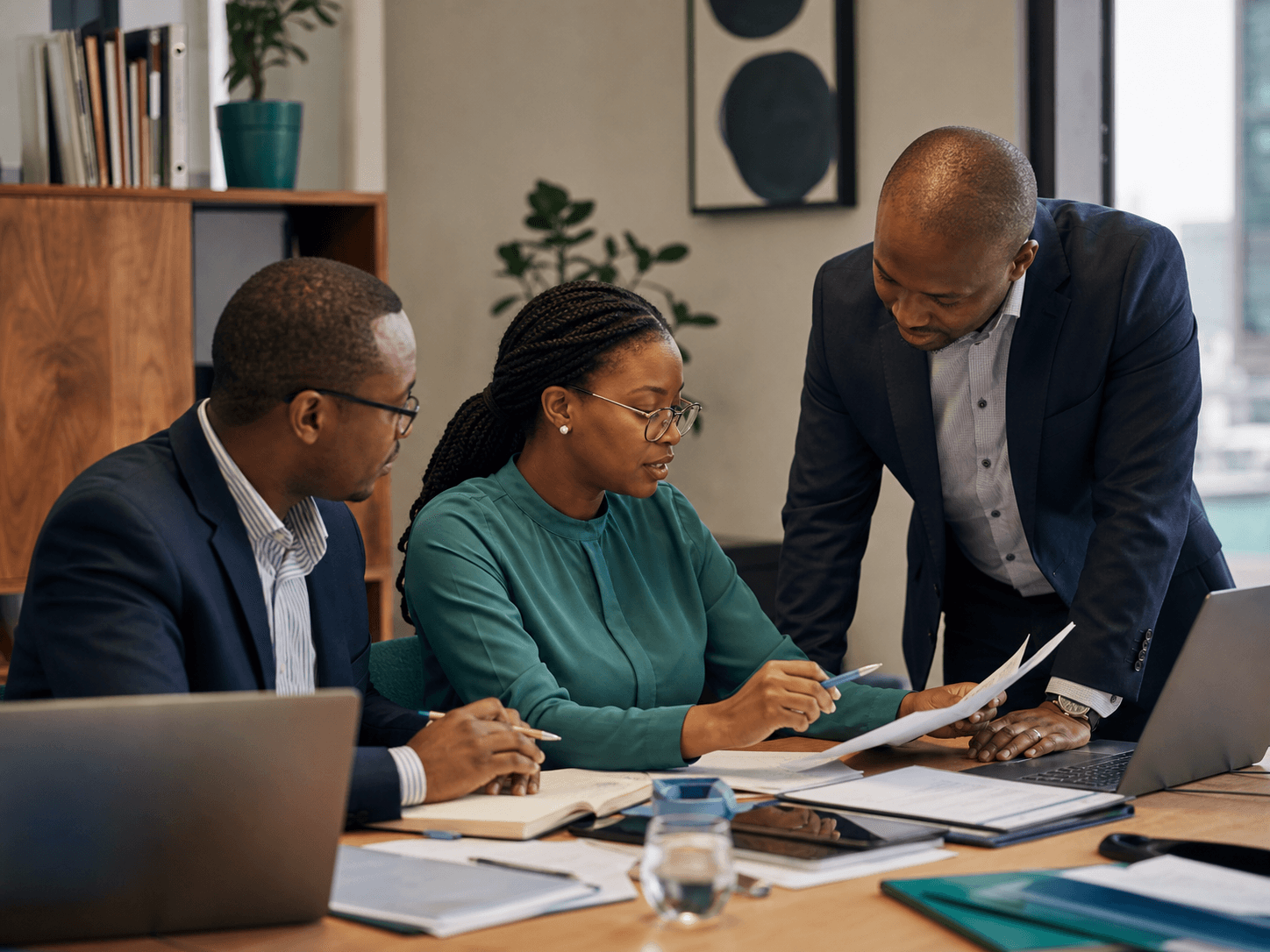 Illustrative scene of a Kenyan professional services team coordinating client delivery